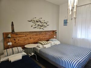 Кровать или кровати в номере VILLA VILLACOLLE