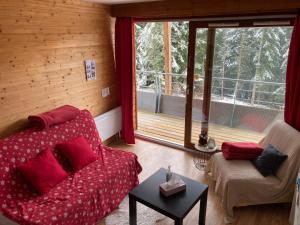 Posezení v ubytování STUDIO CHAMROUSSE 1700 pour 4 personnes - Au calme - Avec WIFI