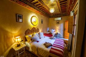 Postel nebo postele na pokoji v ubytování Riad Almonds Marrakech