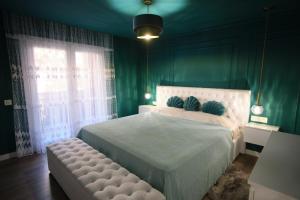 Ένα ή περισσότερα κρεβάτια σε δωμάτιο στο The Luxe Haven