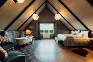 Skálakot Manor Hotel客房内的一张或多张床位