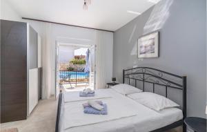 Posteľ alebo postele v izbe v ubytovaní 1 Bedroom Stunning Apartment In Krk