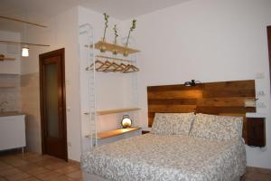 Postel nebo postele na pokoji v ubytování Casa e Giardino Relax in Crema