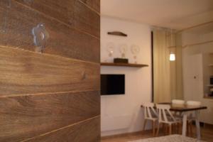 TV a/nebo společenská místnost v ubytování Casa e Giardino Relax in Crema