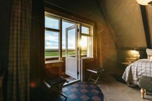 Skálakot Manor Hotel客房内的一张或多张床位