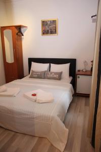 Posteľ alebo postele v izbe v ubytovaní Rooms Eliza