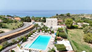 an aerial view of a resort with a swimming pool at Residence Hotel Felix in Ricadi