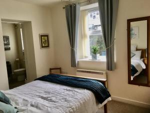 Postel nebo postele na pokoji v ubytování Chapel St Apartments + 55 fotografií