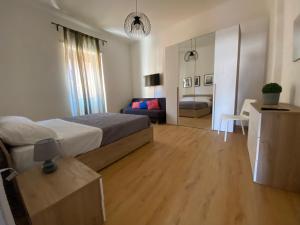 Postel nebo postele na pokoji v ubytování Appartamento in centro
