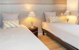 Ένα ή περισσότερα κρεβάτια σε δωμάτιο στο Stunning Home In St Romain En Viennois