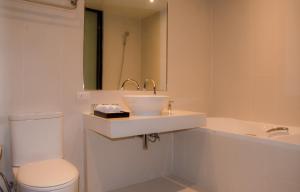 A bathroom at The Erawan Koh Chang -SHA Extra Plus