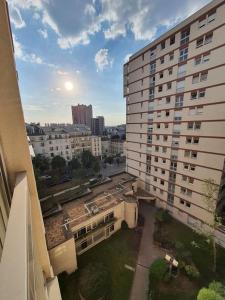 a view of a building from a balcony of a building at Renewed Spacious 35m2 Studio in Paris in Paris