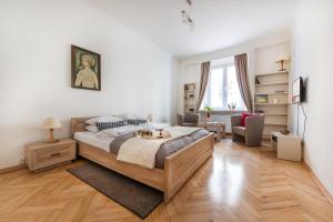 Posteľ alebo postele v izbe v ubytovaní P&O Podwale Apartments
