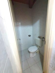 a bathroom with a toilet and a shower at Apartment in Zamardi - Balaton 53130 in Zamárdi +8 photos