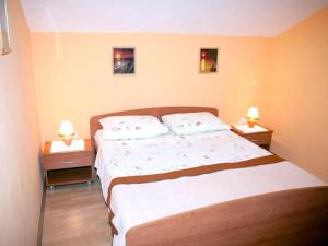 Postel nebo postele na pokoji v ubytování Apartment Mirni