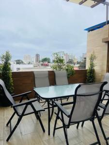 Balkoni atau teres di Departamento privado hermoso