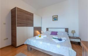 Postel nebo postele na pokoji v ubytování Holiday Apartment Suhi Potok 07
