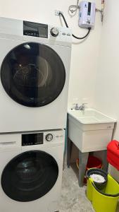 Kuchyň nebo kuchyňský kout v ubytování Distrito Artemisa Loft Apartments