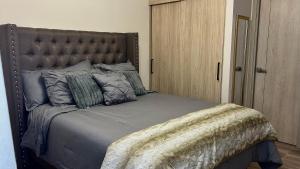 Postel nebo postele na pokoji v ubytování Distrito Artemisa Loft Apartments