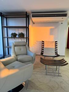 Posezení v ubytování Molas, piso 12, piscina y cine