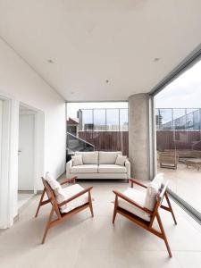 Posezení v ubytování Molas, piso 12, piscina y cine