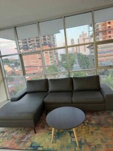 Posezení v ubytování Molas, piso 12, piscina y cine