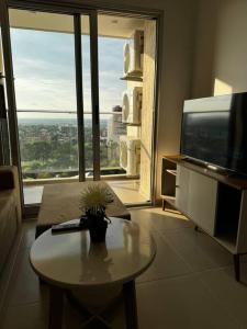 TV a/nebo společenská místnost v ubytování Molas, piso 12, piscina y cine