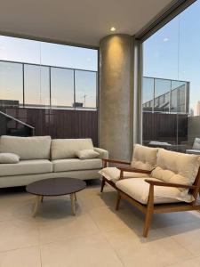 Posezení v ubytování Molas, piso 12, piscina y cine