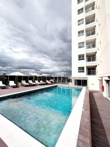 Bazén v ubytování Molas, piso 12, piscina y cine nebo v jeho okolí