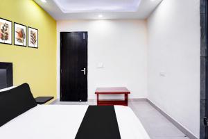 Postel nebo postele na pokoji v ubytování Super Hotel O Varn Residency And Hotels + 21 fotografií