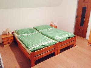 Posteľ alebo postele v izbe v ubytovaní Apartment U Anděla