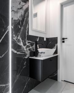 Kúpeľňa v ubytovaní Kasprzaka 29 By Perfect Apart Free Garage