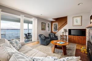 a living room with a couch and a table at Crystal Lake Serenity in Beulah