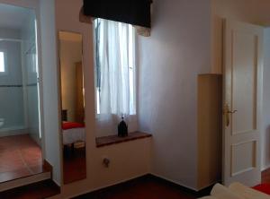 Kúpeľňa v ubytovaní Apartamentos Casa la Costanilla