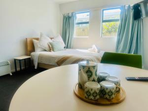 Postel nebo postele na pokoji v ubytování AAA Northlands Motel