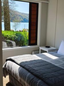 Postel nebo postele na pokoji v ubytování Braxmere Lodge + 37 fotografií