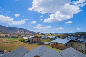 Fotografija v galeriji nastanitve 牧弋南坡藏式艺术民宿 v mestu Shangri-La
