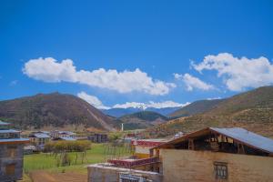 Fotografija v galeriji nastanitve 牧弋南坡藏式艺术民宿 v mestu Shangri-La