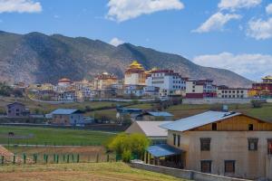 Fotografija v galeriji nastanitve 牧弋南坡藏式艺术民宿 v mestu Shangri-La