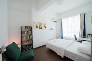 Postel nebo postele na pokoji v ubytování Trival Gloryland Homestay Sri Indah Sandakan + 17 fotografií