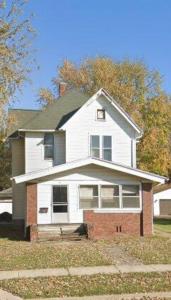 a white house with a red brick at Miah Accommodation in Galesburg