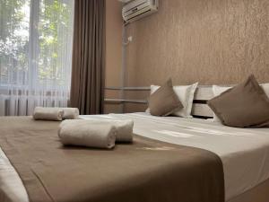 Postel nebo postele na pokoji v ubytování Kausar Hotel + 34 fotografií