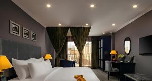 Voodi või voodid majutusasutuse Matilda Boutique Hotel & Spa toas