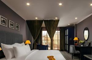 Voodi või voodid majutusasutuse Matilda Boutique Hotel & Spa toas