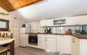 Kuchyň nebo kuchyňský kout v ubytování Apartment Jadrija 09