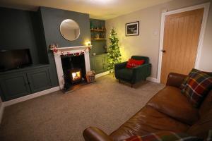 Et opholdsområde på Auctioneers Cottage + 36 billeder