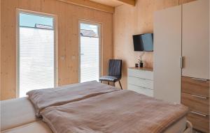 Postel nebo postele na pokoji v ubytování Ferienhaus 4 Wolfsschlucht