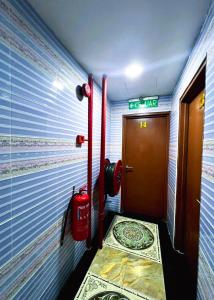 Postel nebo postele na pokoji v ubytování ARK Hotel New Wave Shah Alam