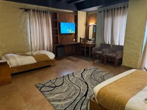 Rúm í herbergi á Annapurna Boutique Hotel