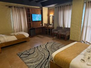 Rúm í herbergi á Annapurna Boutique Hotel